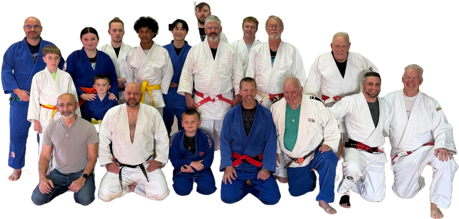 CAJA students and instructors of all ages and belt ranks together on the mat